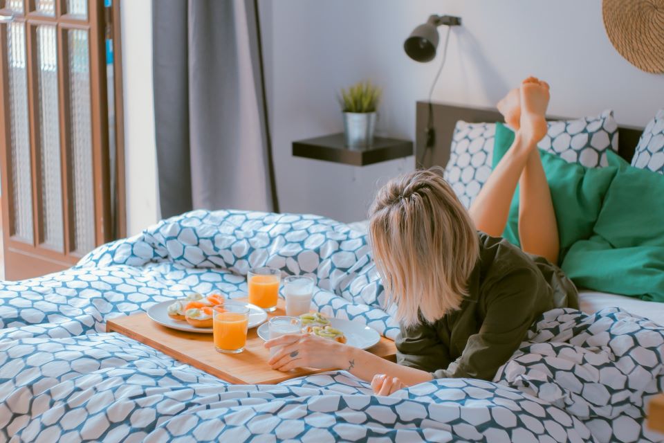 woman lying on bed